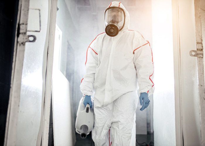 Biohazard technician preforming a cleanup for a home in Auburndale, FL