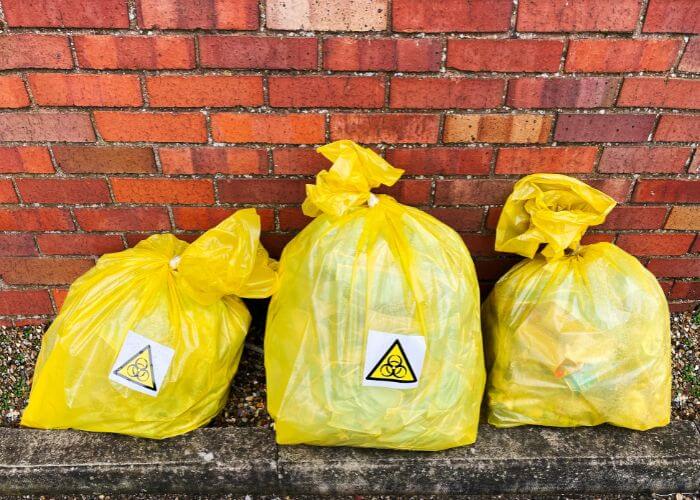 Bags of biohazardous materials outside a building in Auburndale, FL
