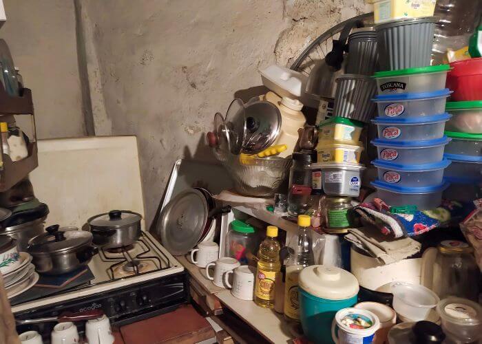 A pile of kitchenware during a hoarder house cleaning in Clearwater, FL